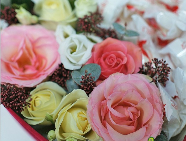 Heart-shaped Box with Roses and Raffaello Chocolates photo